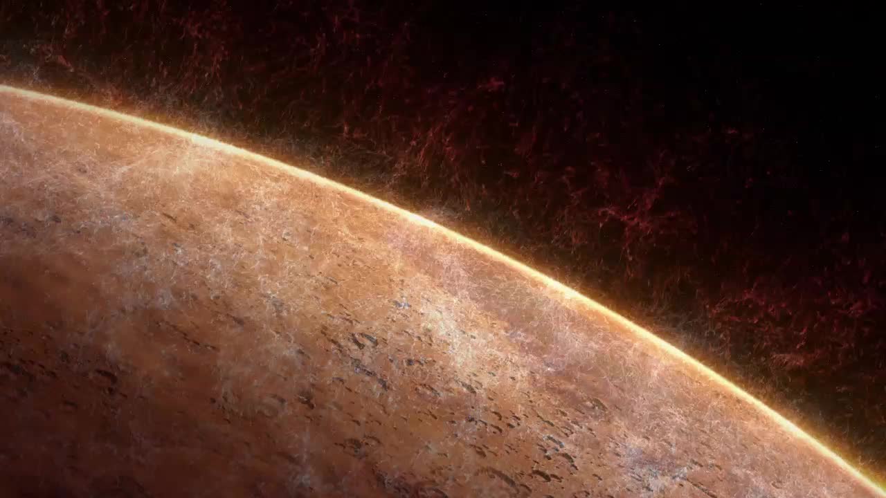 A close up of Mars' red surface, showing water rising from it
