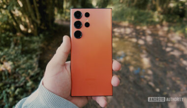 red galaxy s23 ultra in hand 16 9