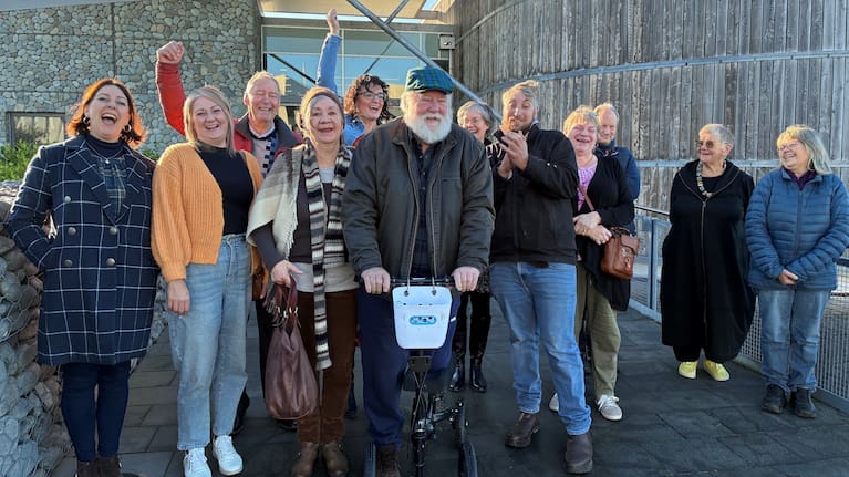 Representatives of the Upper Selwyn Huts celebrating the Selwyn District Council decision to adopt a 30-year deed of licence for the settlement that had been facing eviction.