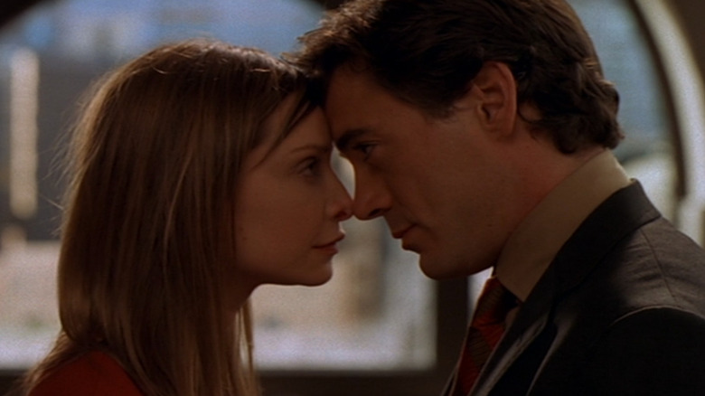 Larry and Ally touch foreheads in Ally McBeal (1997)