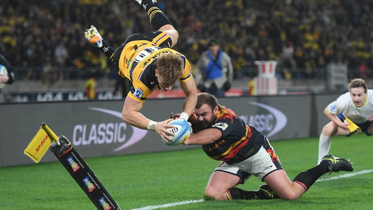 Ruben Love takes flight to score his second try in the grand final against the Chiefs.