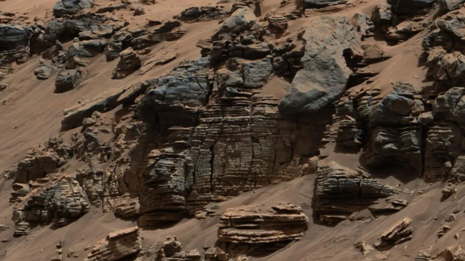 Area on Mars where flowing water would have once entered a lake.