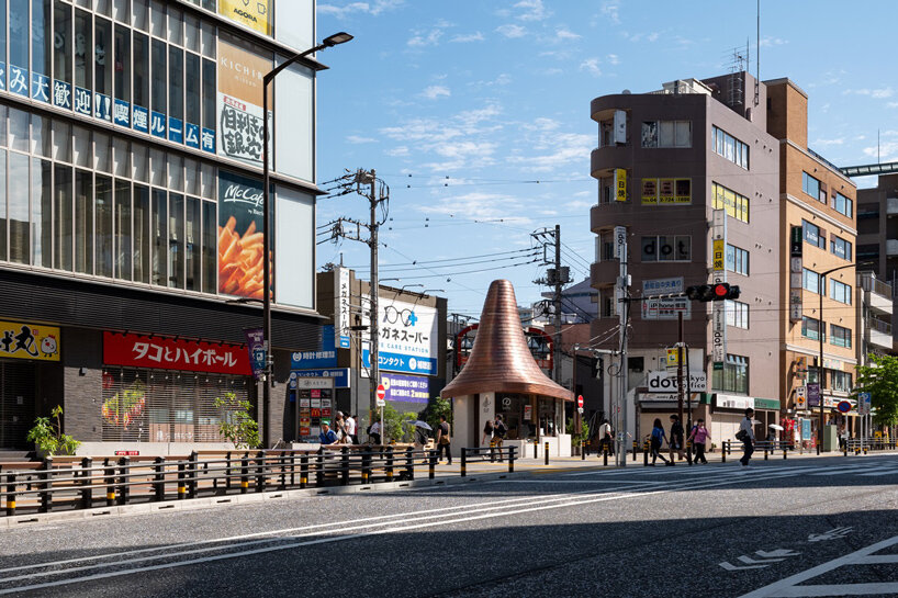 sculptural copper canopy tops micro-landmark community hub in tokyo by nikken sekkei - 2