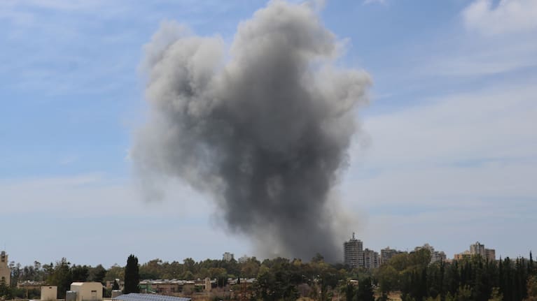 Smoke rises following an Israeli airstrike in the southern port city of Tyre, Lebanon.