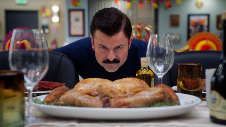 Captain Edward Caesar Penisi, Jr. staring down a turkey