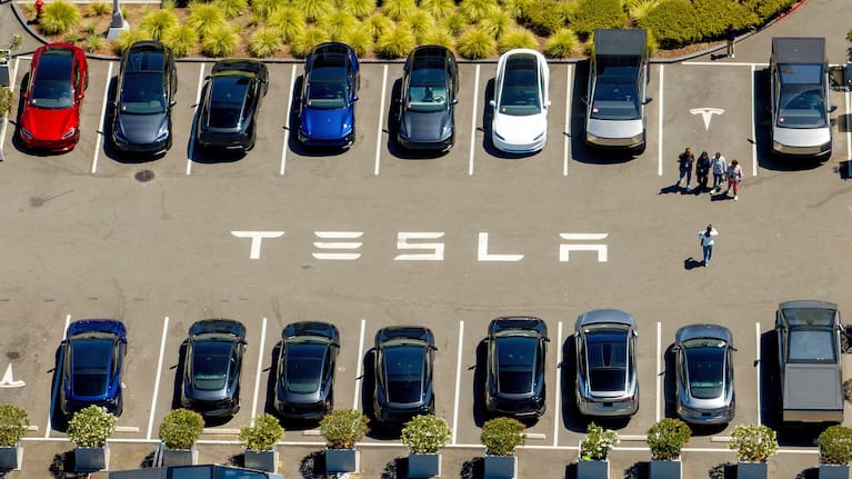 Tesla vehicles line a parking lot at the company's Fremont, Calif., factory on Aug. 5, 2025. (file image)