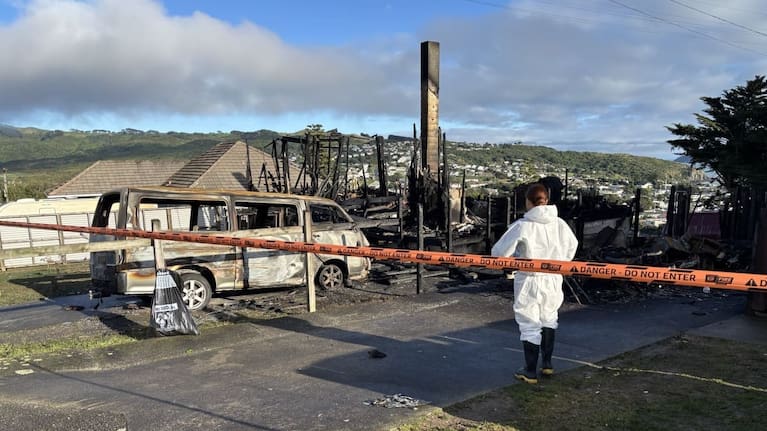 The aftermath of a fire in Spur Grove, Tītahi Bay, Porirua, on 21 June 2026.