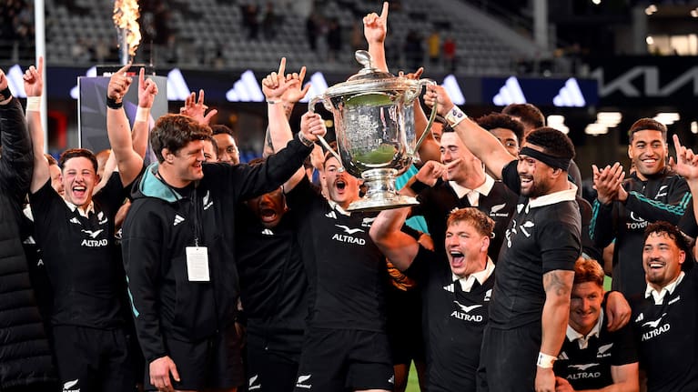 The All Blacks celebrate retaining the Bledisloe Cup at Eden Park last year..
