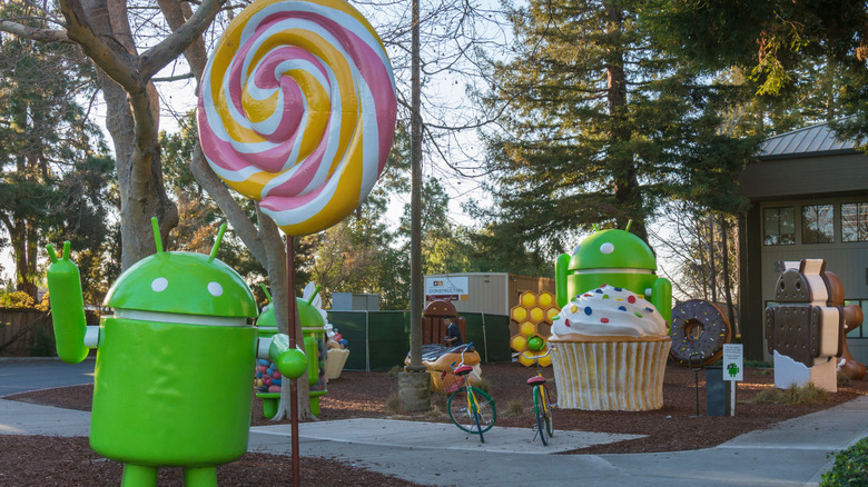 Android bot mascot with sweet treats at the Google campus.