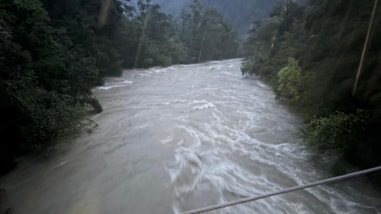 The flooded river.