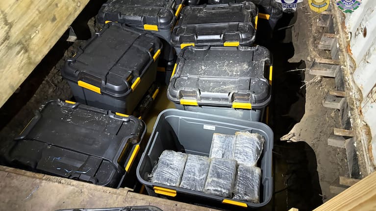 The tubs were buried in underground bunkers concealed by false container floors, the AFP said.