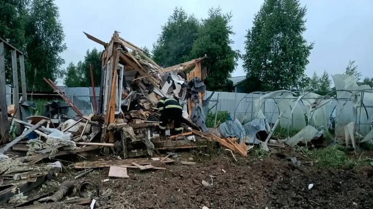 This photo released by Moscow Region Governor Andrei Vorobyev's official telegram channel shows the damage in a country side after a Ukrainian drone attack.