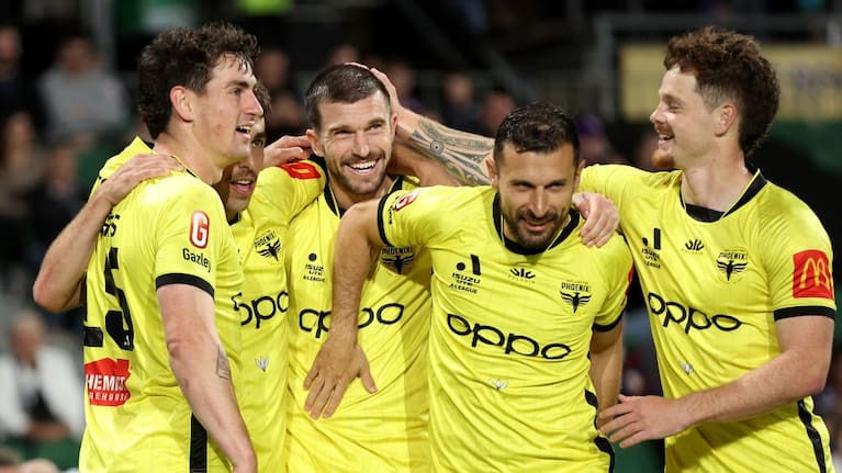 Tim Payne of Wellington Phoenix celebrates a goal against Perth Glory.