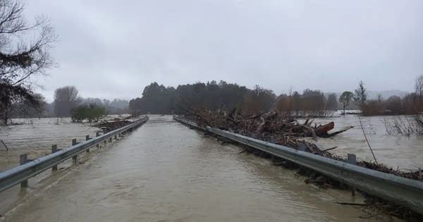 Hundreds stranded after storm wipes out vital bridge