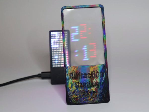 This Diffraction Grating Clock Hides Its Digits — Unless You're Looking Through the Lens