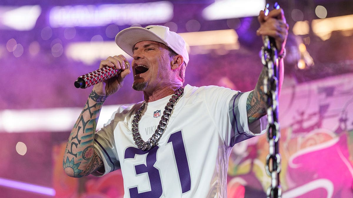 Vanilla Ice performing on stage during halftime at an NFL game in Minnesota in December 2024.