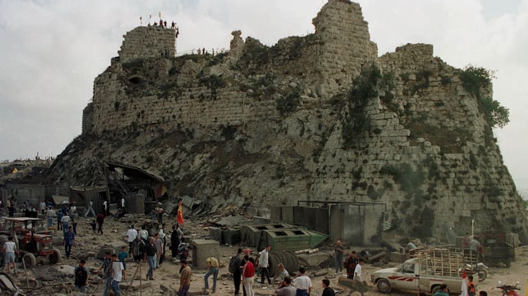 Villagers inspect the damage to Beaufort Castle, 10 km northwest of the southern market town of Nabatiyeh, Lebanon.