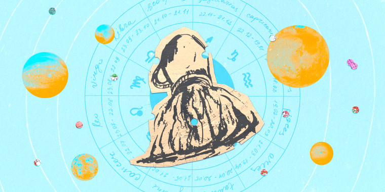 Paper cutout of the aquarius zodiac on a blue background