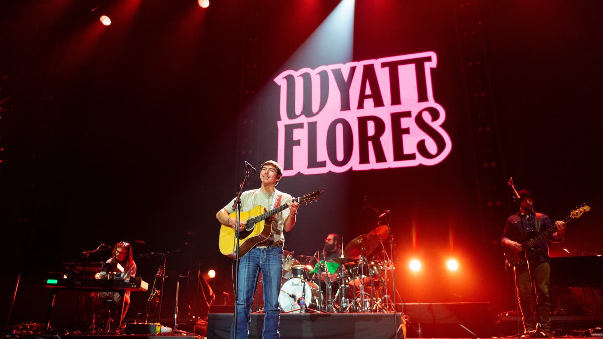 Wyatt Flores performing on stage at The O2 Arena in London