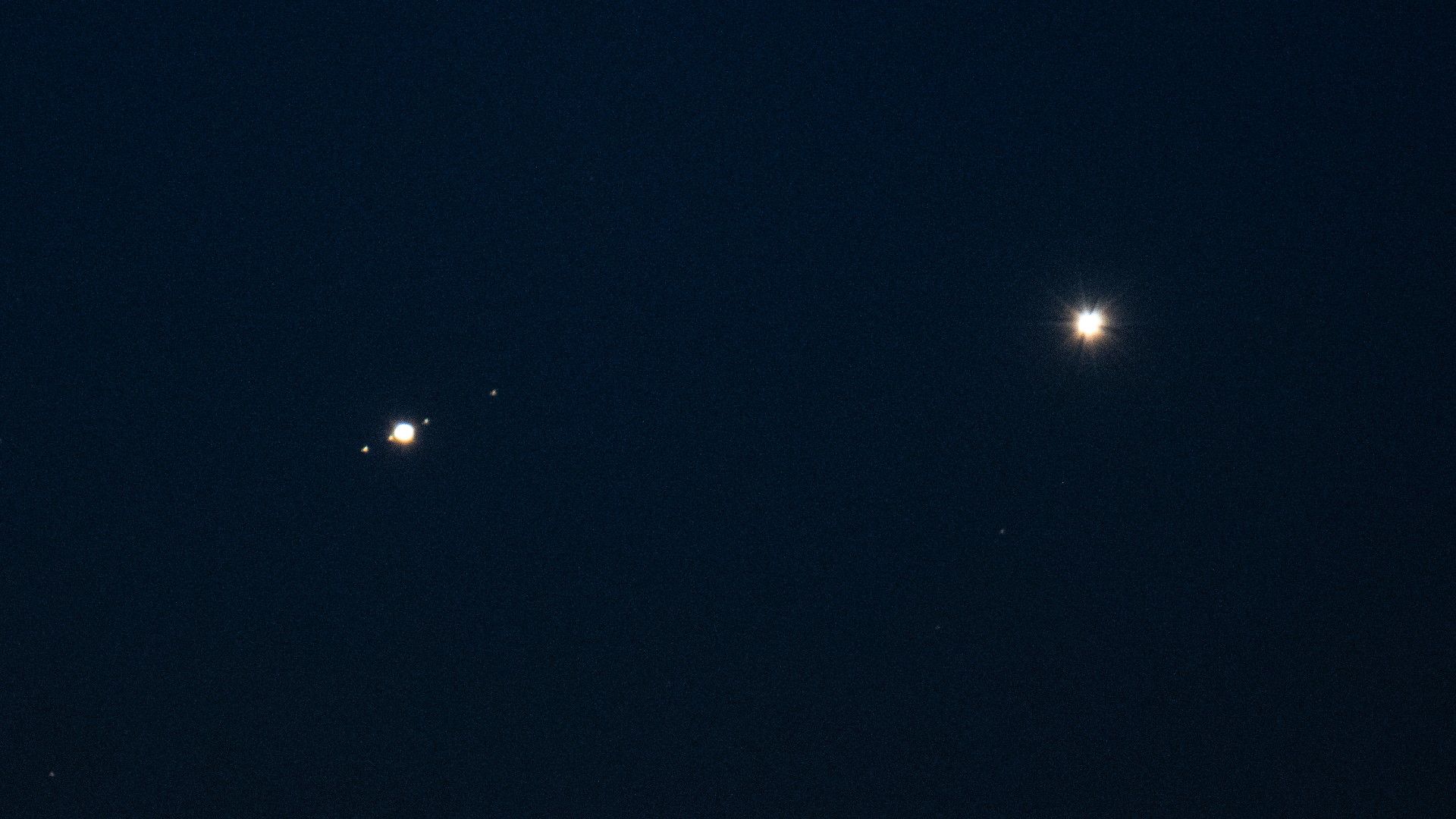 two bright dots in the night sky