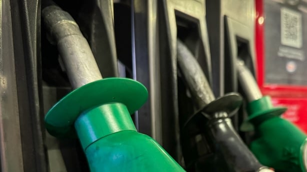Petrol pumps are seen on a petrol station forecourt,=