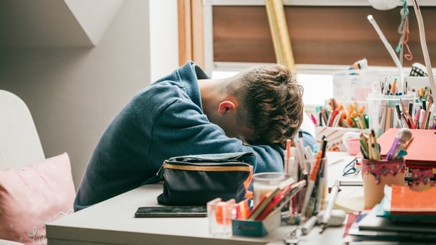 stressed student during home schooling pandemic alert