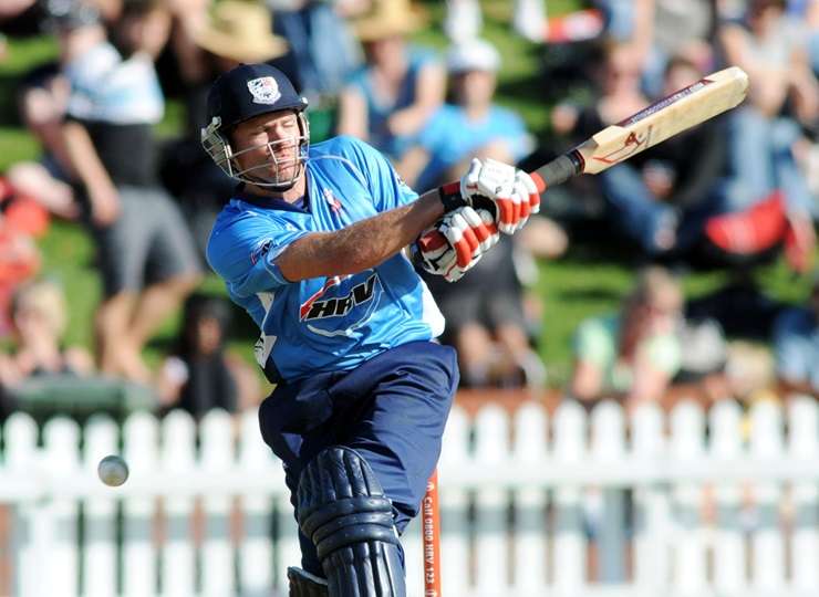 Lou Vincent swings hard at the Hagley Oval, in Christchurch, during the 2025 T20 Black Clash. Photo / Getty Images