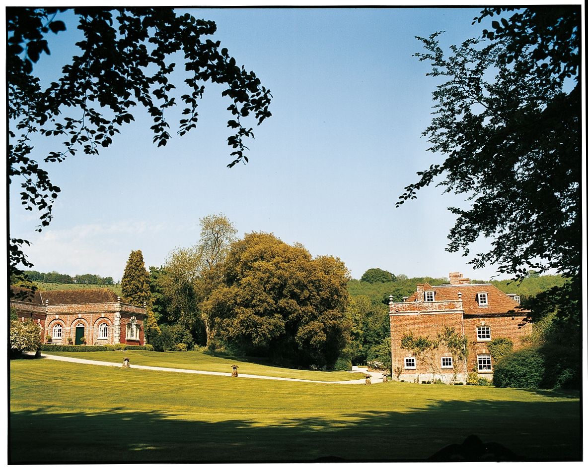 Image may contain Grass Plant Field Lawn Tree Architecture Building Housing Nature Outdoors Vegetation and House