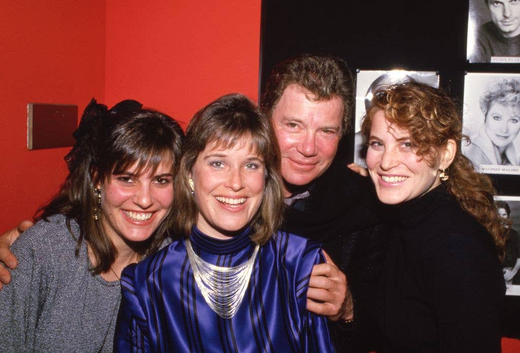 WIlliam with his three daughters in the 1980s