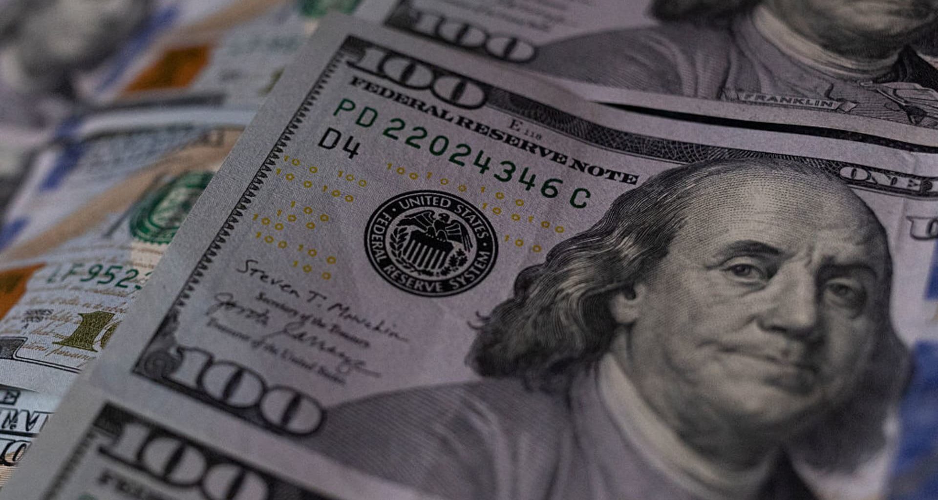 Dollar slides after soft jobs report, yen surges