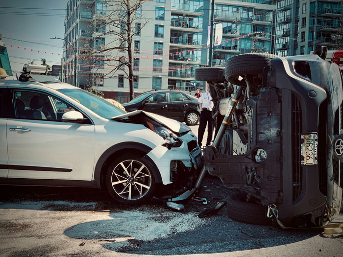 An overturned car after an accident, illustrating patients who tried to outsmart their doctors and failed.