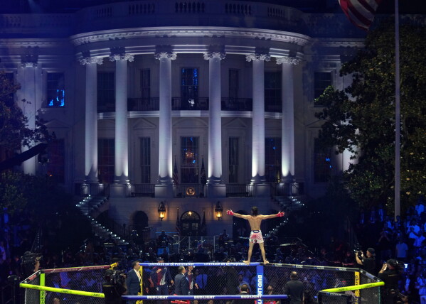 Diego Lopes celebrates during a featherweight bout against Steve Garcia during UFC Freedom 250 on the South Lawn of the White House, Sunday, June 14, 2026, in Washington. (AP Photo/Mark Schiefelbein)