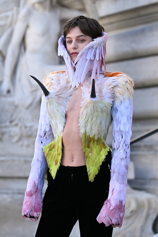 Emma Corrin arrives for the Schiaparelli Haute Couture Fall/Winter 2026-2027 Women's collection presented in Paris, Monday, July 6, 2026. (AP Photo/Emma Da Silva)