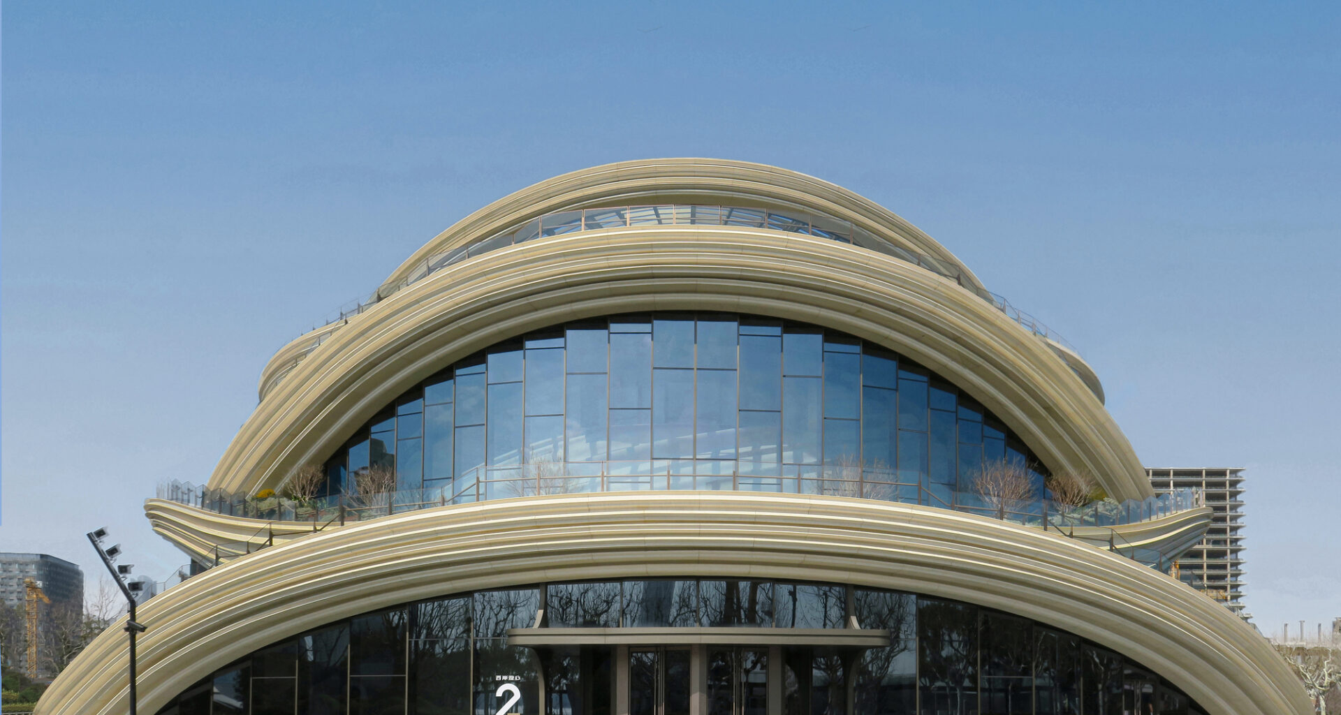 Paul Clemence Captures Heatherwick Studio's West Bund Orbit Along Shanghai's Huangpu River