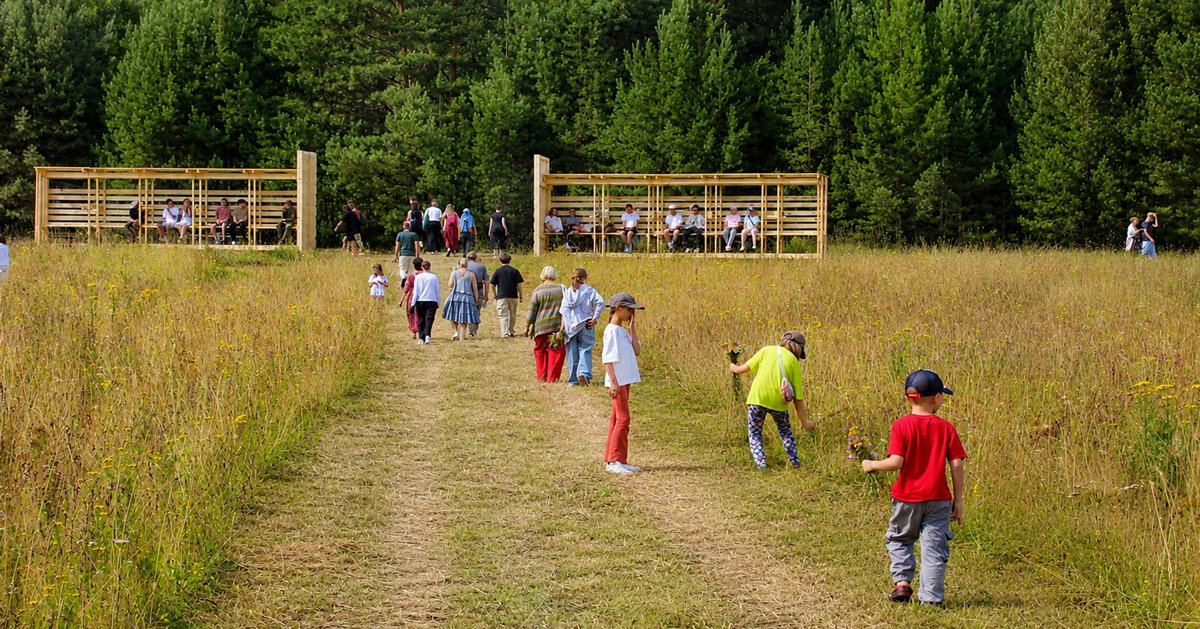 twin timber gateways frame open-air architectural park in russia