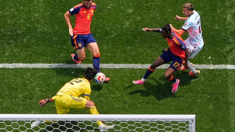 Spain's Mikel Merino (6) scores their second goal during the World Cup quarterfinal