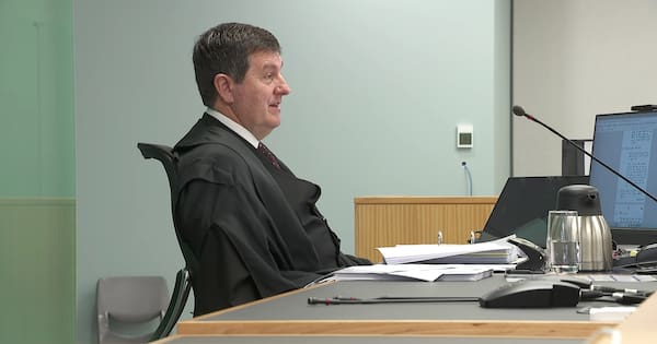 Judge rules case to proceed against former police officers in Alan Hall case