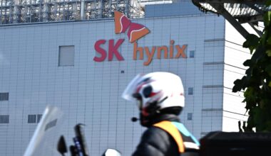 A delivery worker passes in front of an SK hynix chip plant in Icheon, Gyeonggi Province, in this file photo from Oct. 29, 2025. Chip giants