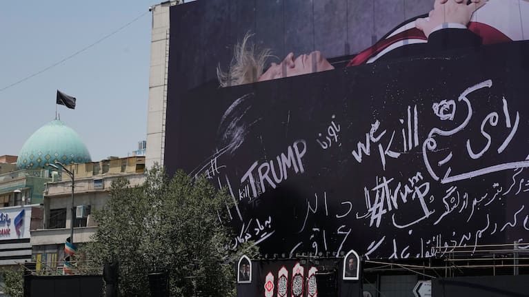 A billboard bearing anti-Trump messages, including the phrase "We Kill Trump," at Islamic Revolution Square in downtown Tehran, Iran.