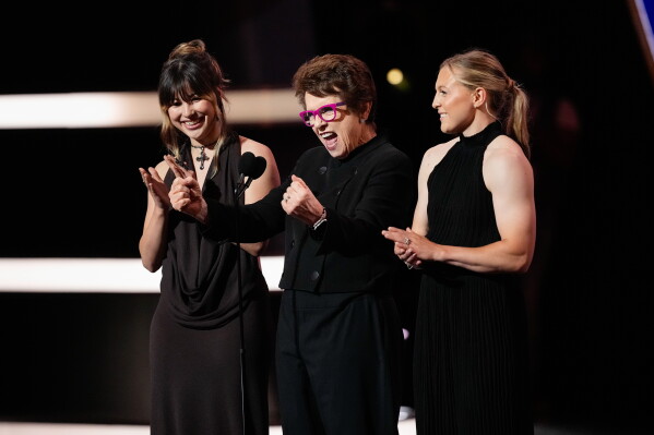 Alysa Liu, left, Billie Jean King, center, and Kendall Coyne Schofield present the Billie Jean King youth leadership award at the ESPY Awards in the David H. Koch Theater at Lincoln Center Wednesday, July 15, 2026, in New York. (AP Photo/Frank Franklin II)