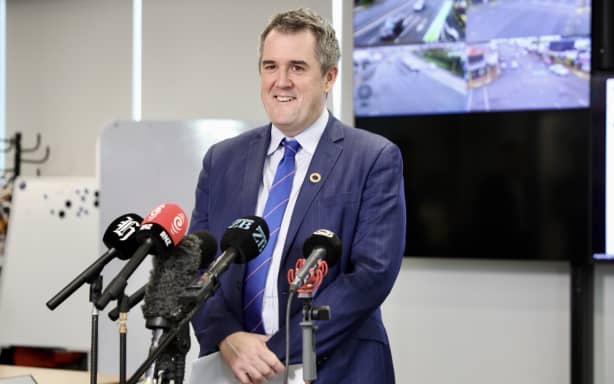 Transport Minister Chris Bishop making an announcement in Auckland