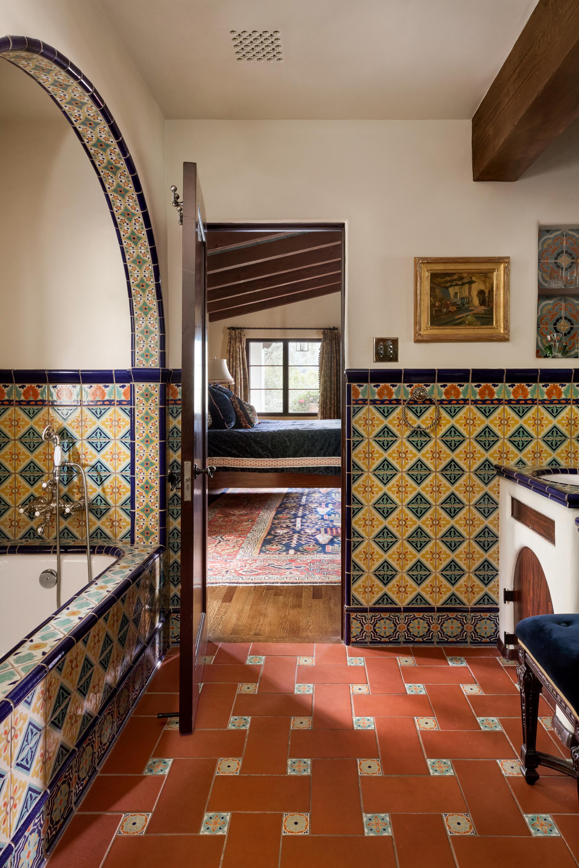 “We’re not afraid of pattern,” said Teri Lauenstein—as reflected in her primary bathroom.