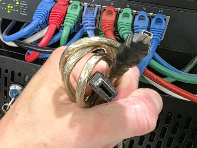 Firewire cable in front of network switch