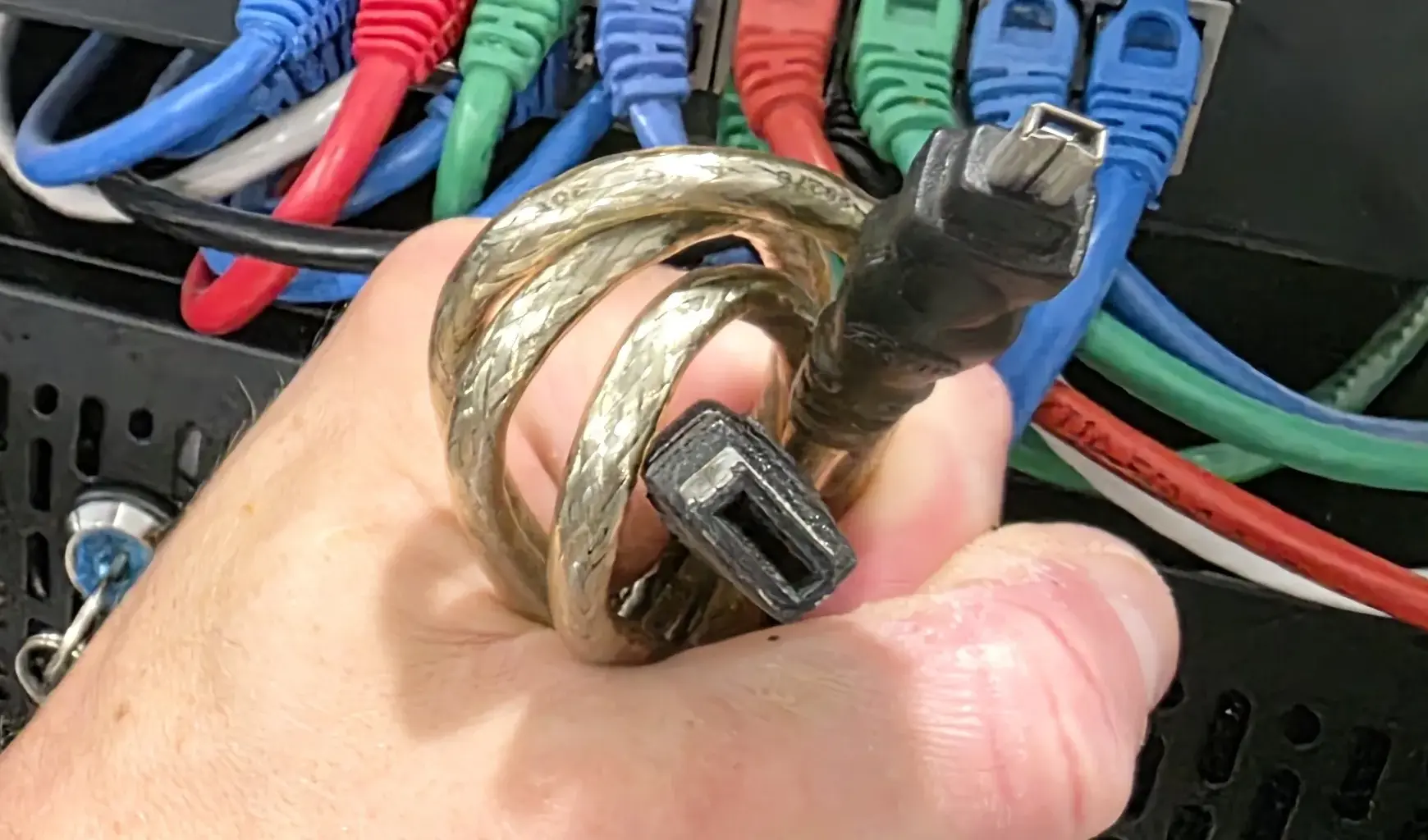 Firewire cable in front of network switch