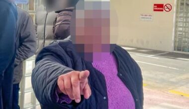 Woman with prominent sportsperson facing charges shoves reporter outside court