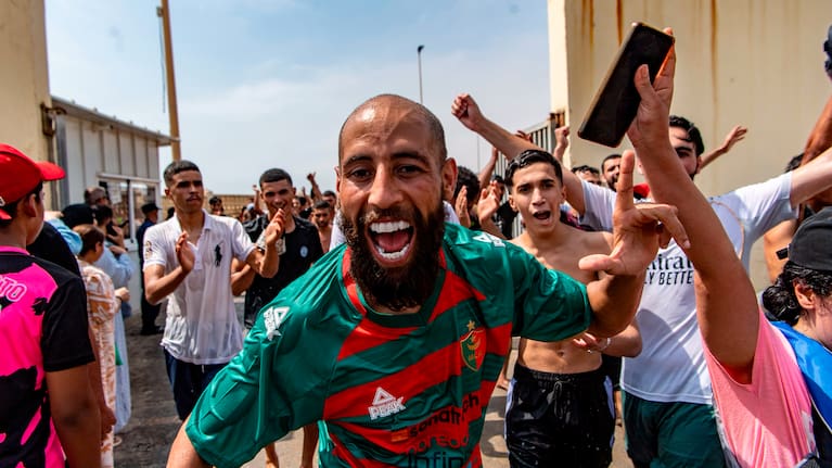 Migrants cross from Morocco into the Spanish enclave of Ceuta.