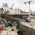 December 2022, Engineered with Atkinson Construction, the heavy temporary bridge falsework spans cleanly over Wilshire Boulevard to support the upcoming concrete pours while maintaining active city traffic below.. Image © Aleksey Kondratyev “Building a Swiss Watch Out of Concrete”: Clark Construction on LACMA’s David Geffen Galleries - Image 25 of 27