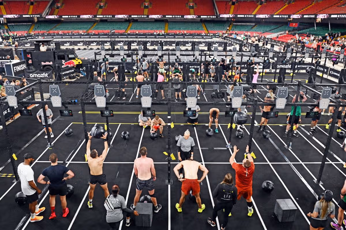 People taking part in exercise stations in the Principality Stadium 