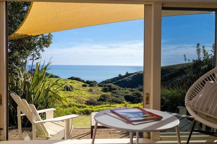 The famed treehouse Airbnb for sale is part of a larger off-grid property for sale in Raglan. Photo / Supplied