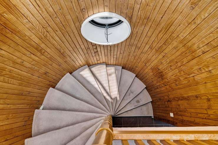 The chateau for sale at 913 River Road, Queenwood, in Hamilton, was designed by renowned architect Roger Walker and built in the 1970s. Photo / Supplied